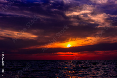 Scenic view of beautiful sunset above the sea in purple colors