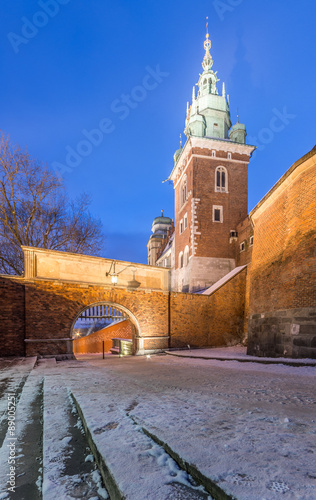 Winter morning view of the Sigismund bell tower of the Krakow cathedral on the Wawel Hill and main castle gate. #89005251