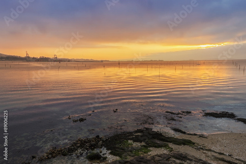 Fototapeta Naklejka Na Ścianę i Meble -  Golden dusk on Arousa Bay