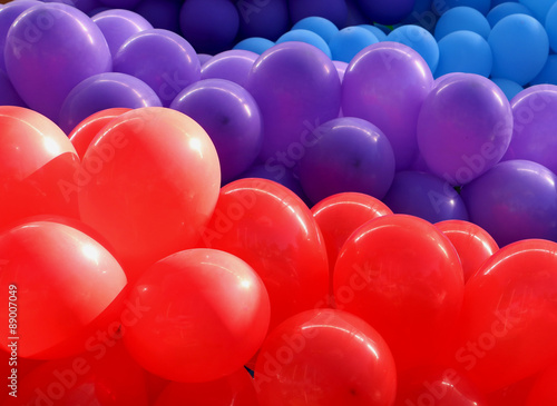 Group od red, violet and blue balloons