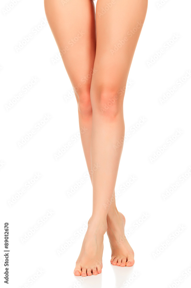 Long woman legs on a white background Long woman legs on a white background
