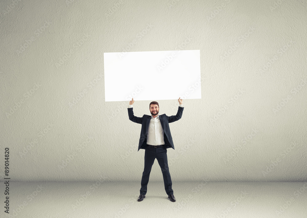 businessman holding big white banner businessman holding big white banner