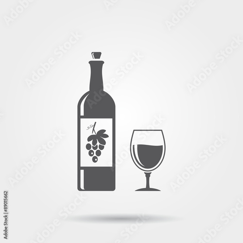 Bottle of wine with a glass - vector icon