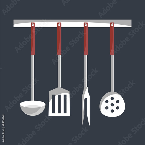 Kitchen tools on a hanger.