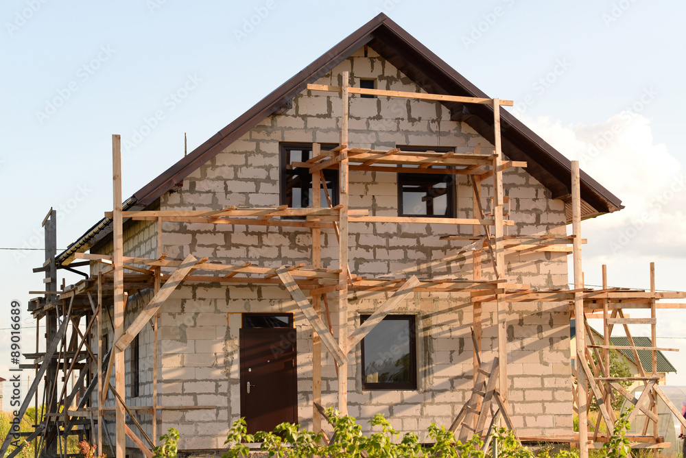 two-storey house under construction