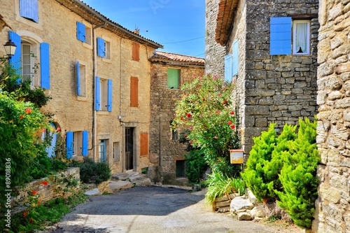 Pretty houses with colorful shuttered windows in a quaint village in Provence, France