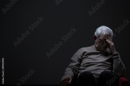 Despairing senior man photo