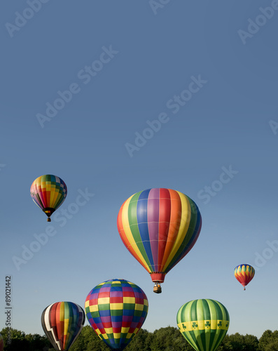 Hot-air balloons ascending or launching at a ballooning festival © JRB