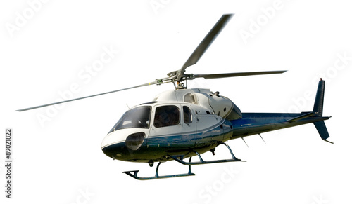 Photo Helicopter in flight isolated against white