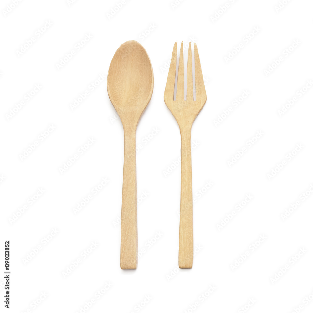 brown wooden spoons and fork on white background brown wooden spoons and fork on white background