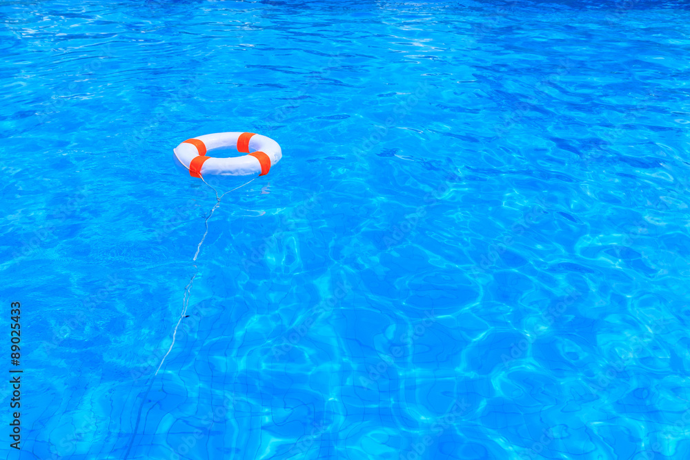 Life buoy floating in a swimming pool