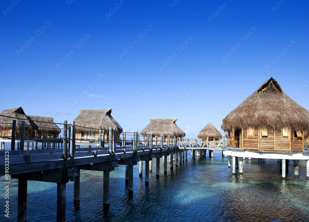 houses over the transparent quiet sea water houses over the transparent quiet sea water