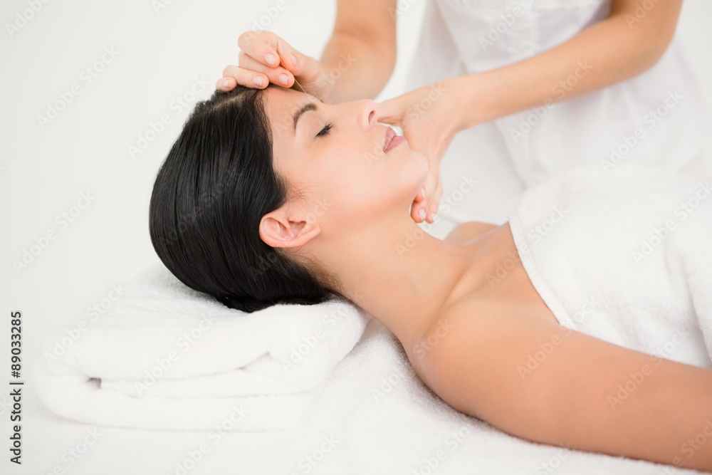 Woman in an acupuncture therapy