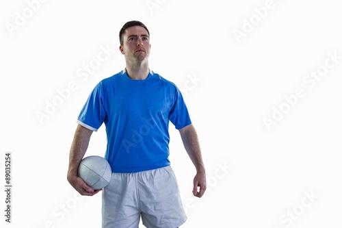 Rugby player holding a rugby ball