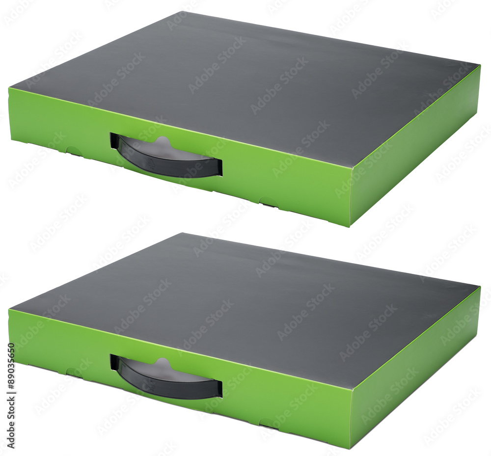 Flat black and green cardboard box with handle isolated on white. With shadow and without. In horizontal situation. Flat black and green cardboard box with handle isolated on white. With shadow and without. In horizontal situation.