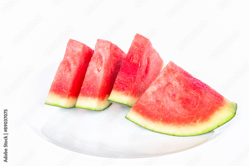 Watermelon slices on white plate isolate on white Watermelon slices on white plate isolate on white