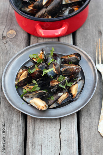 Steamed fresh mussels with wine and parsley.