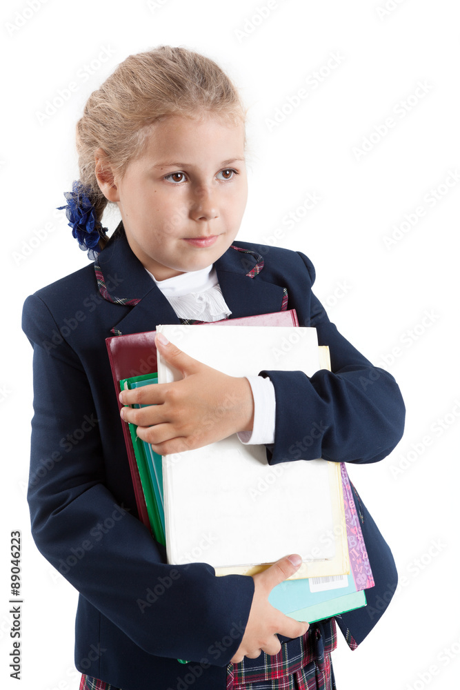 Schoolgirl holding textbooks on hands, isolated on white background Schoolgirl holding textbooks on hands, isolated on white background