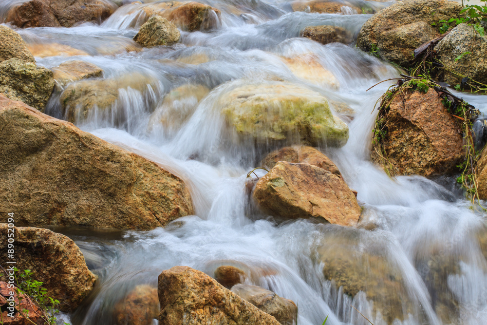 waterfall and rocks covered with moss waterfall and rocks covered with moss