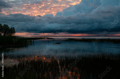 sunrise over marsh in Lake Michigan in Mackinaw City