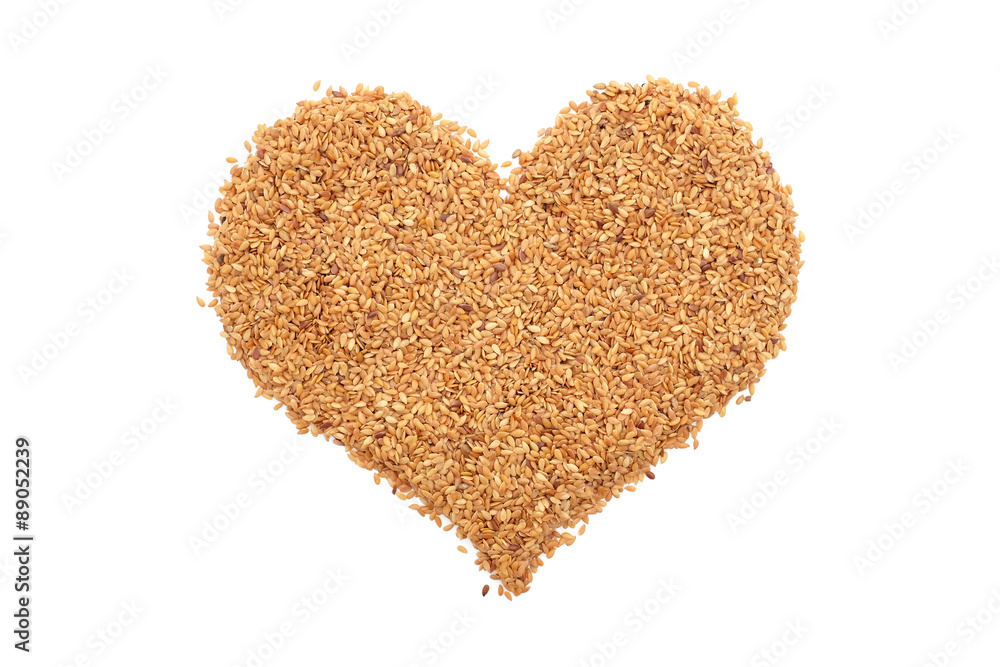 Golden linseed in a heart shape Golden linseed in a heart shape
