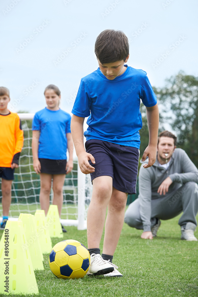 Coach Leading Outdoor Soccer Training Session Coach Leading Outdoor Soccer Training Session