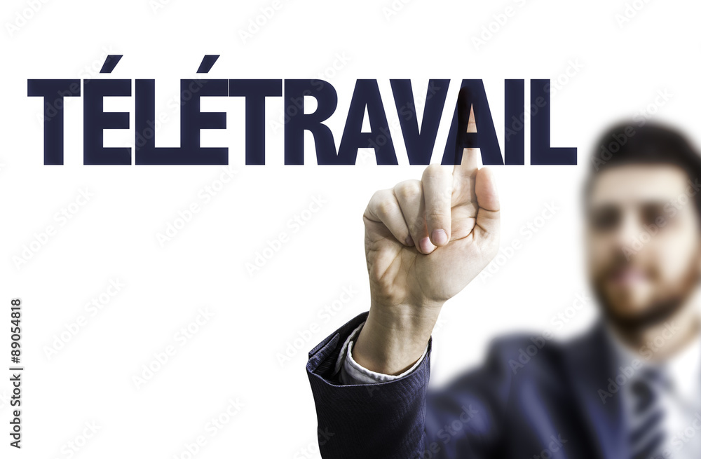 Business man pointing the text: Teleworking (in French) Business man pointing the text: Teleworking (in French)