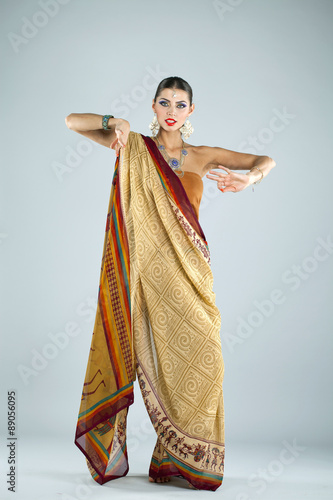 Young traditional Asian Indian woman in indian sari