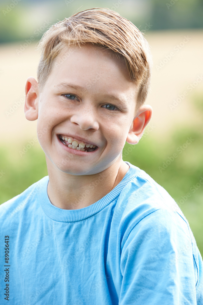 Outdoor Head And Shoulder Portrait Of Smiling Boy Outdoor Head And Shoulder Portrait Of Smiling Boy