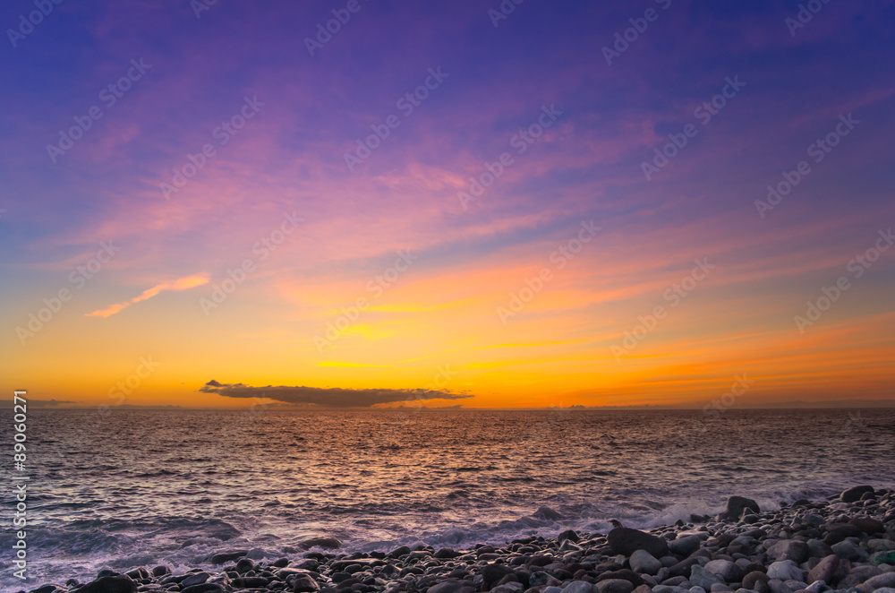 Sunset over the coast of Atlantic ocean