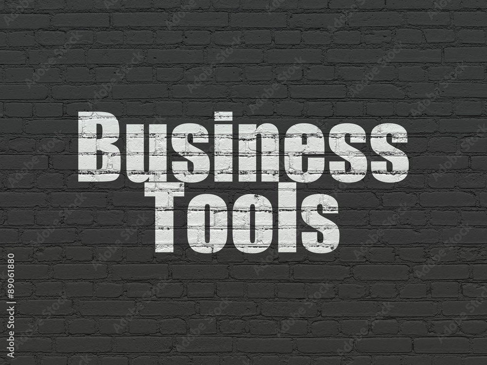 Finance concept: Business Tools on wall background Finance concept: Business Tools on wall background