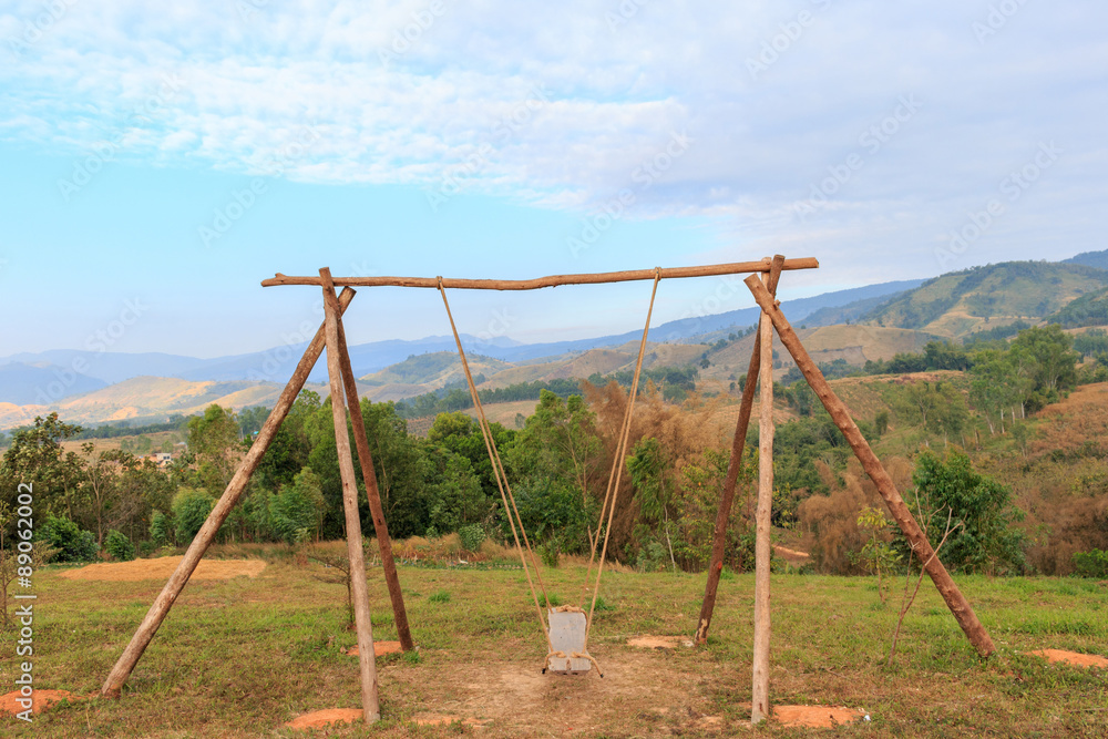 Wooden swing on the mountains by hill tribe, Thailand. Wooden swing on the mountains by hill tribe, Thailand.