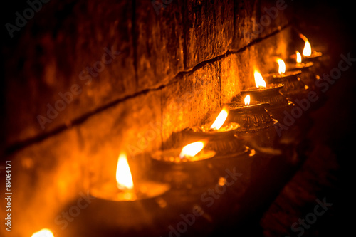 Candles at nepalese temple photo