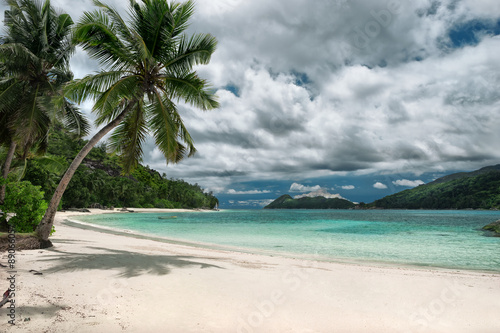 Fototapeta Naklejka Na Ścianę i Meble -  Untouched tropical beach, cloudy sky