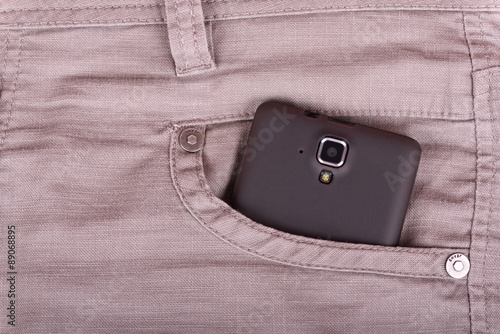 Cellphone in front pocket photo