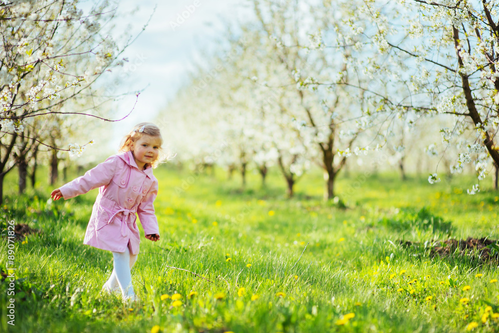 child outdoors in the blossom trees. Art processing and retouchi child outdoors in the blossom trees. Art processing and retouchi
