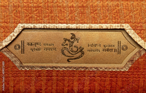 a traditional indian wedding invitation card - colorful, textured ,bold and beautiful well decorated
