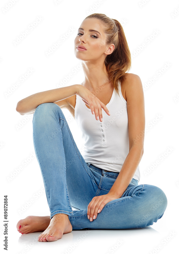 Young girl in jeans and a white t-shirt Young girl in jeans and a white t-shirt