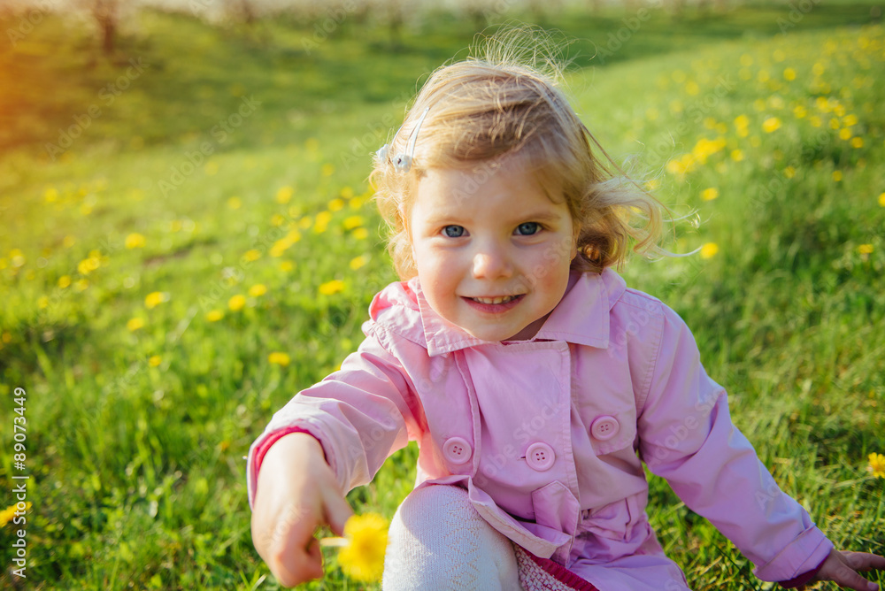 Baby on a green lawn. Art processing and retouching photos speci Baby on a green lawn. Art processing and retouching photos speci