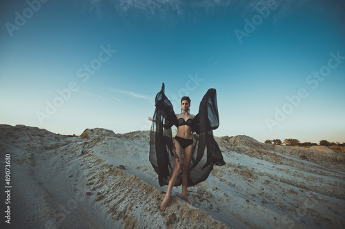 The girl in black linen among sandy dunes 3429.