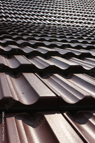 Closeup of brown tiles, roof sheathing