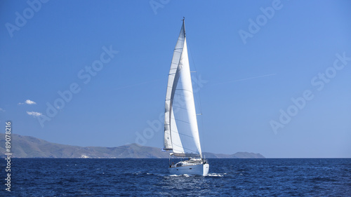 Sailboat participate in sailing regatta. Sailing. Luxury Yachts.