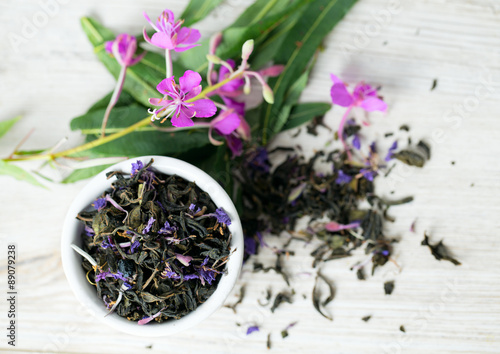 fireweed tea on wooden surface photo