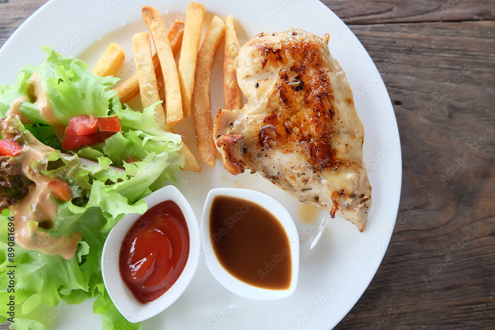 chicken steak on white dish. chicken steak on white dish.