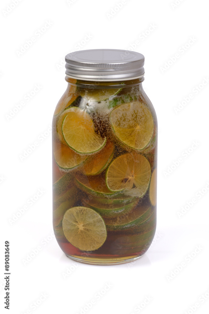 Pickled honey and lemon in a bottle. Pickled honey and lemon in a bottle.