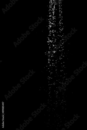 Drops of water on a black background. Texture.