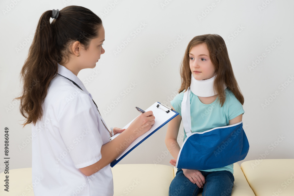 Doctor With Clipboard In Front Of Injured Patient Doctor With Clipboard In Front Of Injured Patient