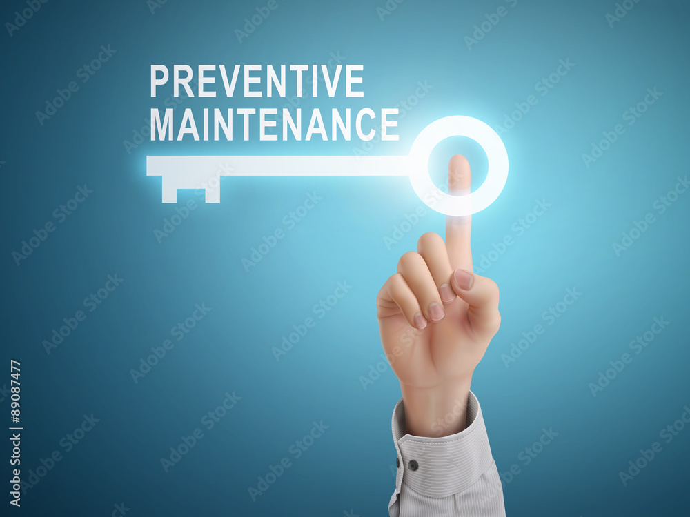 male hand pressing preventive maintenance key button male hand pressing preventive maintenance key button