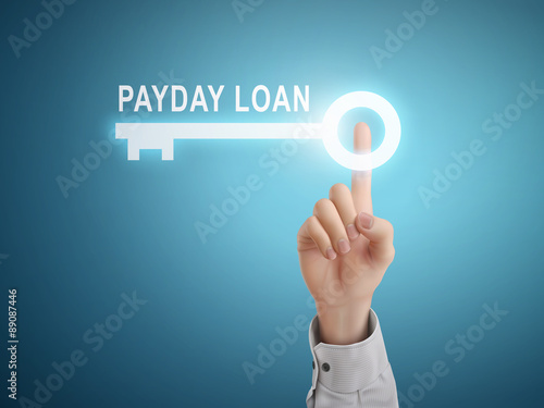 male hand pressing payday loan key button