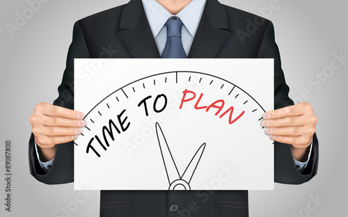 businessman holding time to plan poster